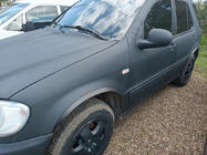 Mercedes ML W163 1997-2005 рр. Накладки на арки (4 шт, чорні, ABS-пластик) фото 1